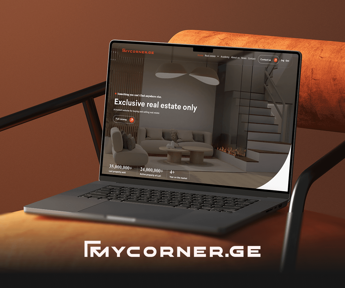 Mycorner.ge real-estate marketplace on a laptop